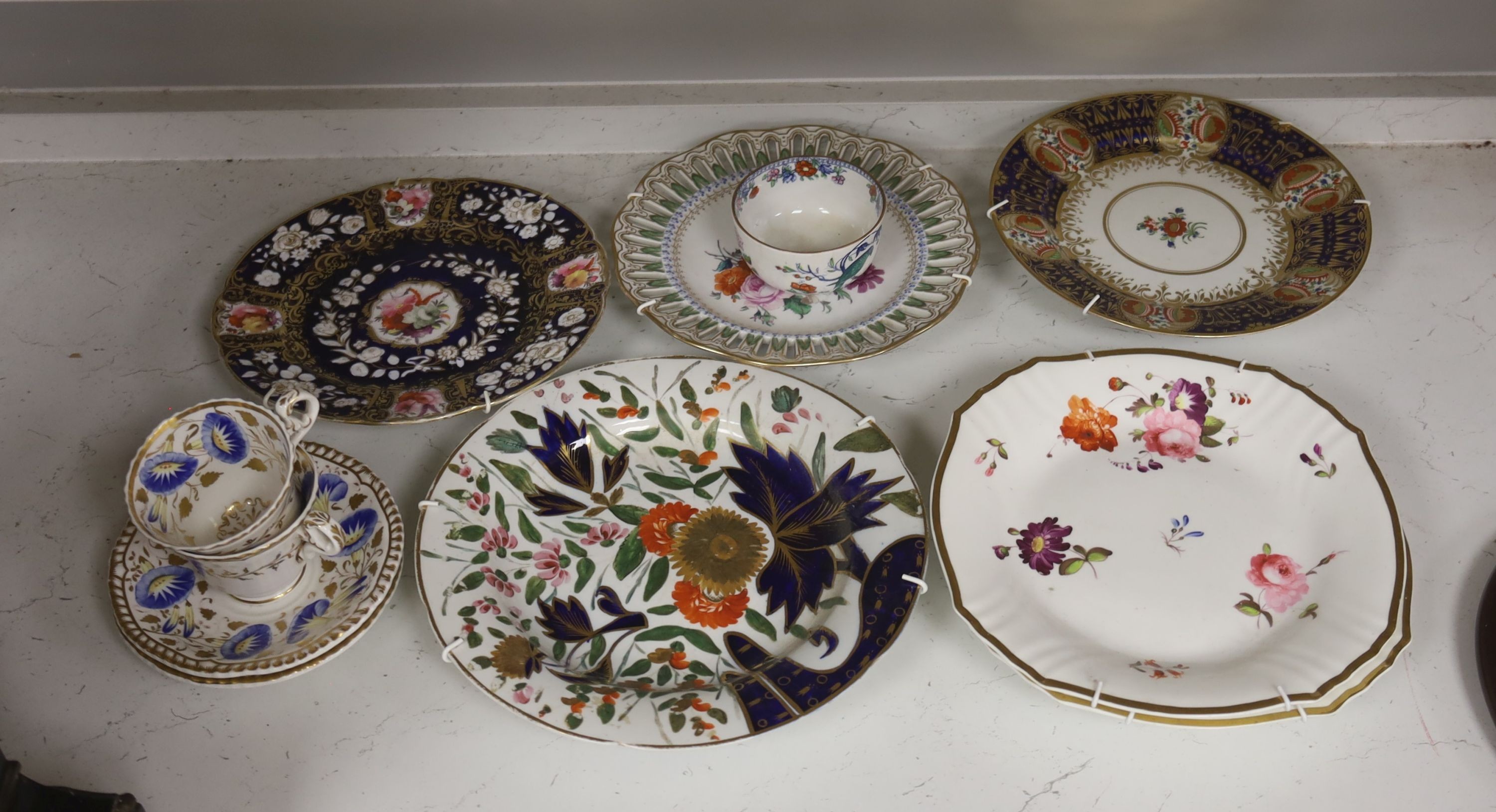 The collection of 19th century English and German porcelain plates, two coffee cups and saucers etc.